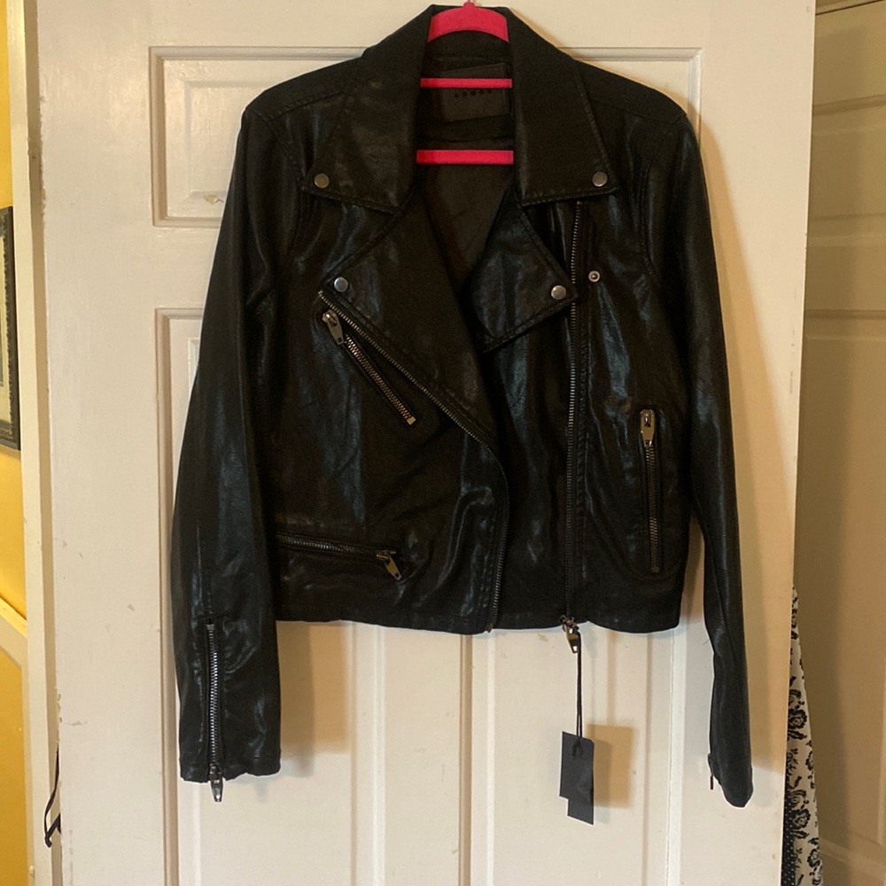 Beautiful faux leather motorcycle jacket. Great details and fit. Size L